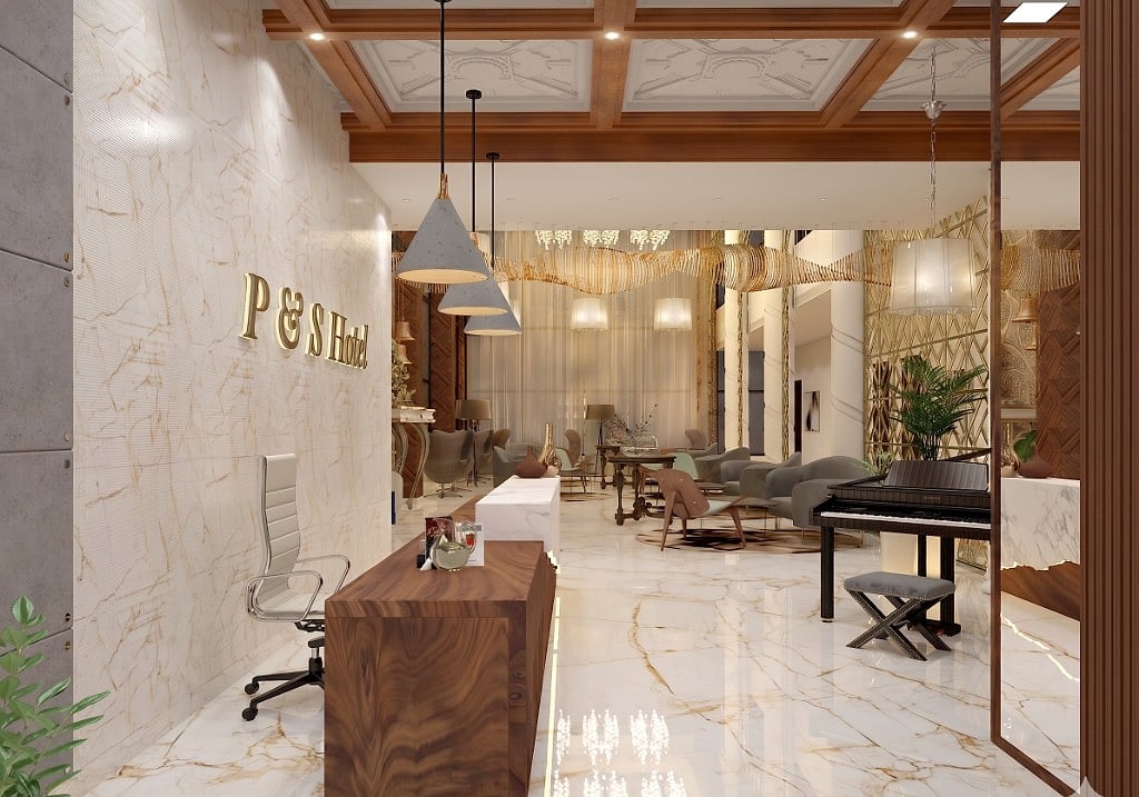 The P&S Hotel reception, the hotel name in brass lettering on a book-matched Italian marble wall behind a walnut-veneer desk, with concrete pendants and a marble-floored lobby beyond