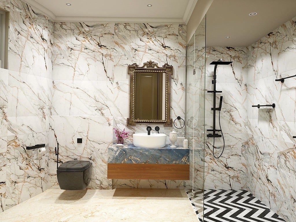 A guest bathroom clad in gold-veined marble with a blue-stone vanity on warm timber, a vessel basin, an antique-gold mirror, black fittings and a walk-in glass shower over a black-and-white chevron floor